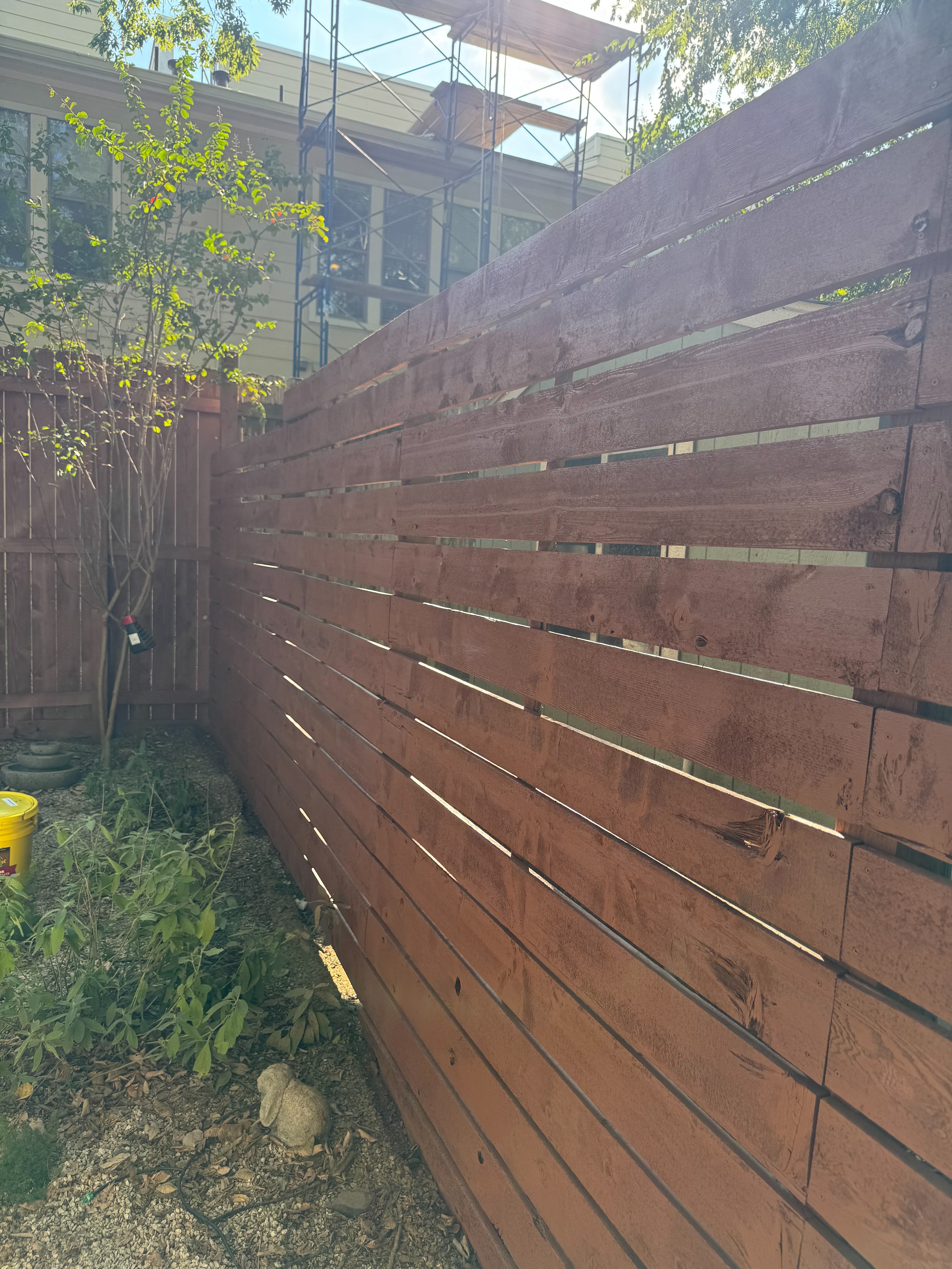 Stained horizontal cedar fence