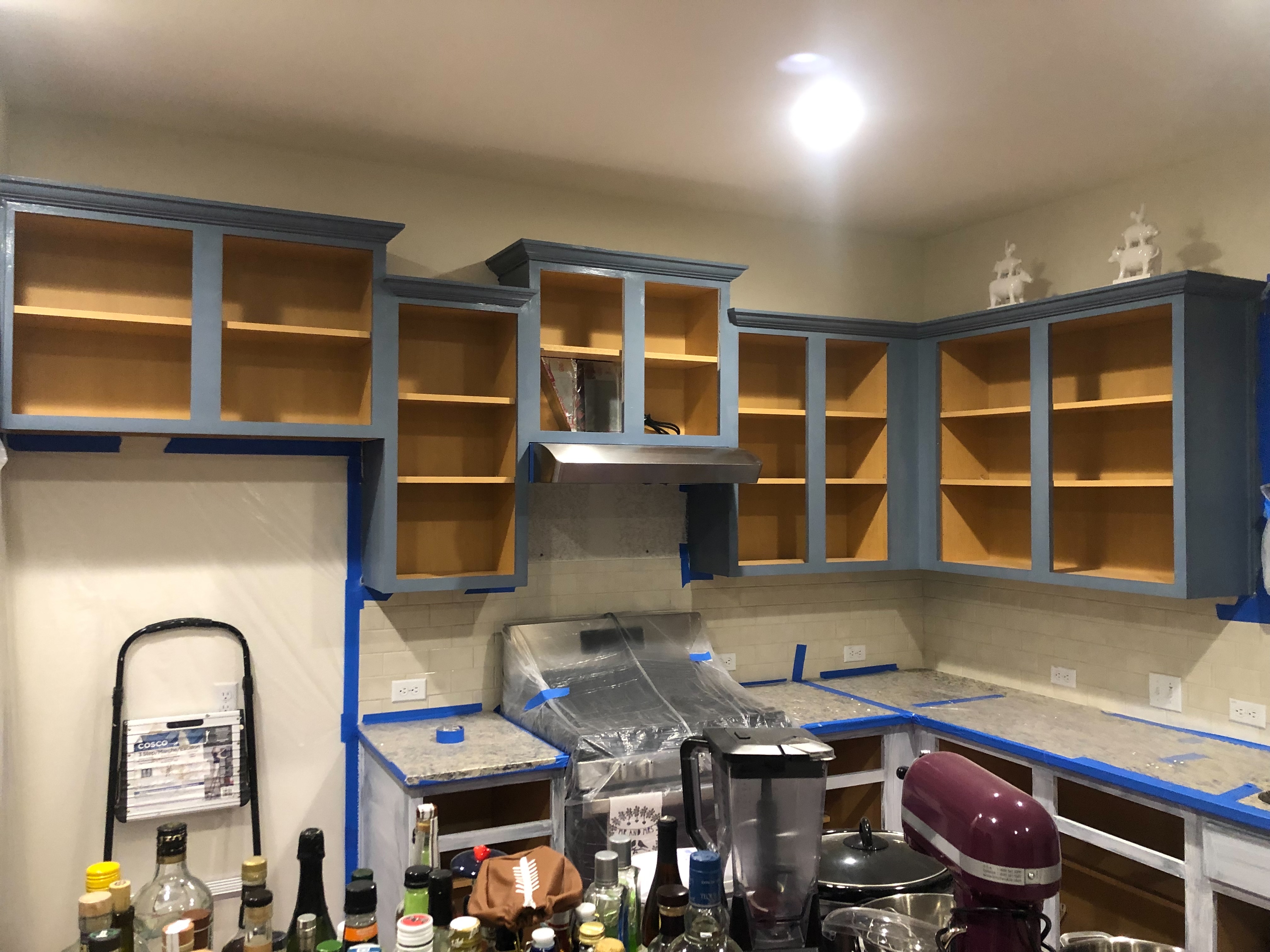 Blue painted kitchen cabinets